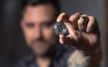 Source photo Person Holding Silver Bitcoin Coin · Free Stock Photo (pexels.com)