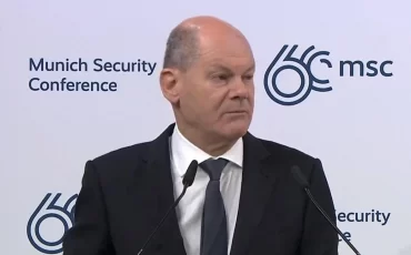 Олаф Шольц, скригншот видео