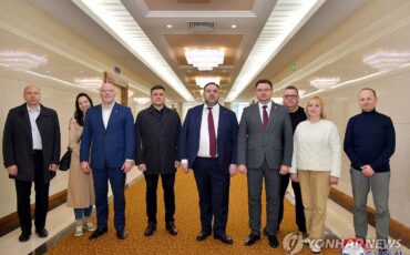 Беларусская делегация в Северной Корее. Фото: Yonhap