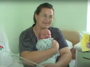 Ольга Воронич с новорожденным сыном. Фото из соцсетей